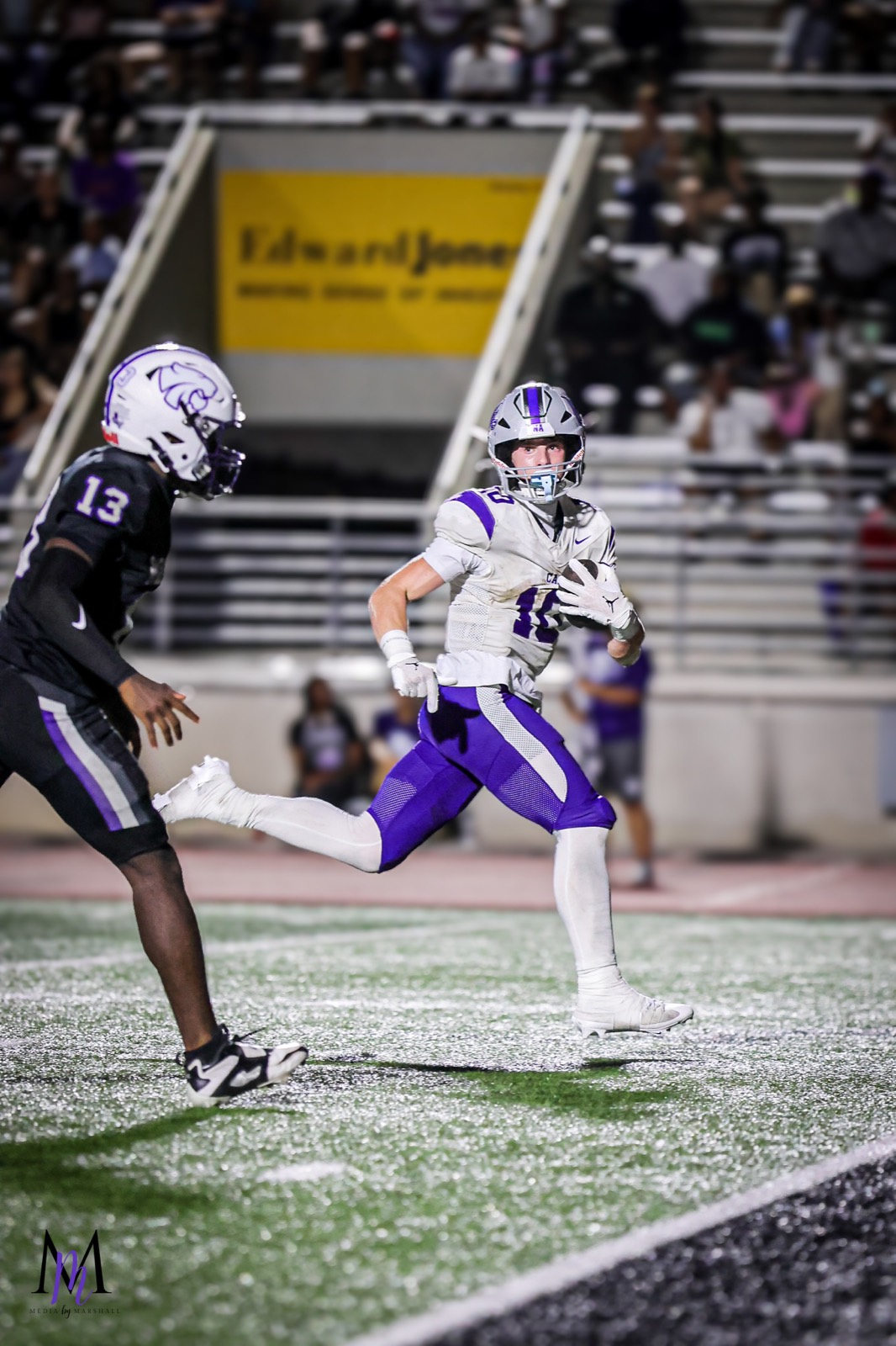 Senior wide receiver Cooper Karns shakes a Humble defender in the open field