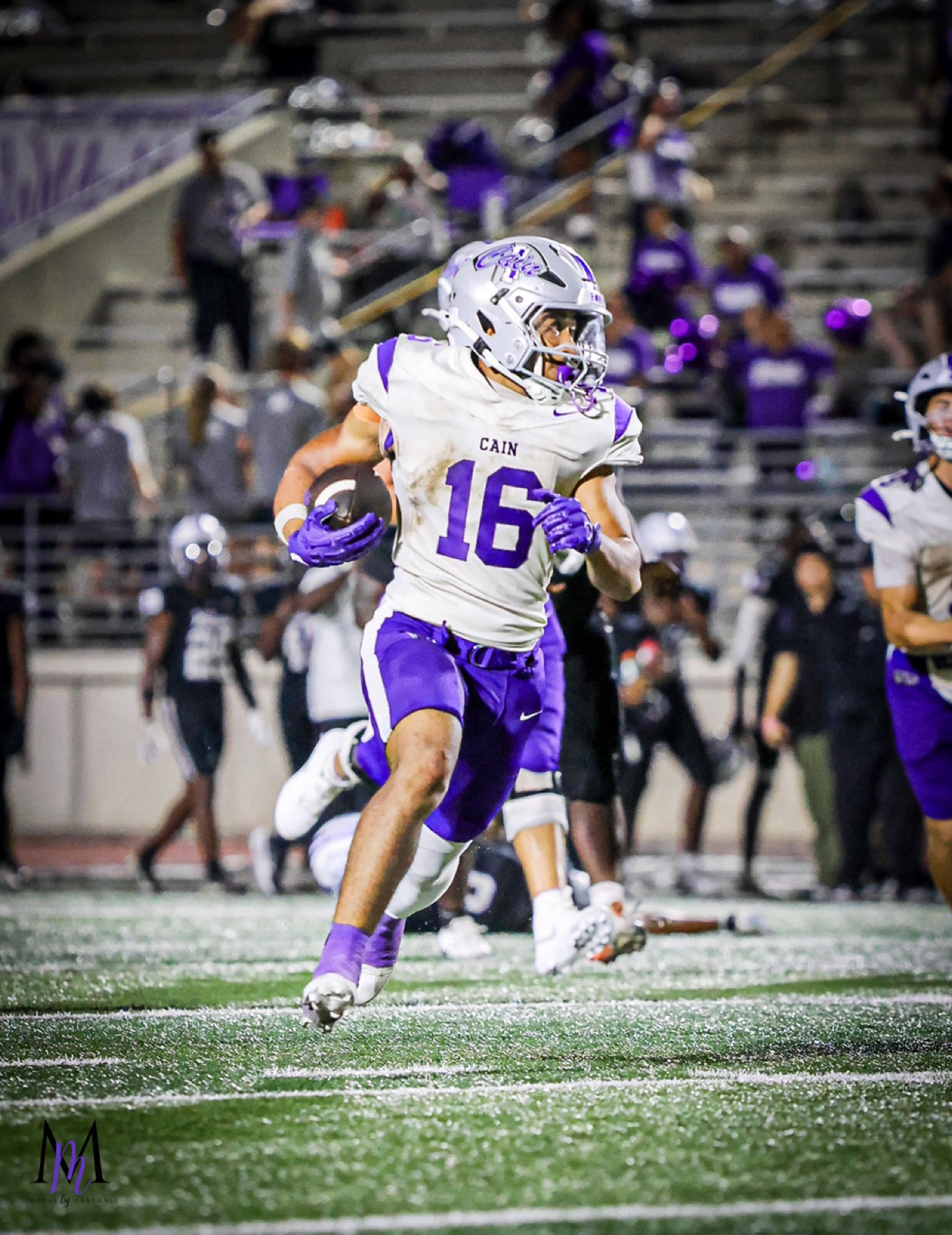 Senior running back Eyan Johnson bursts through the defense on an explosive run