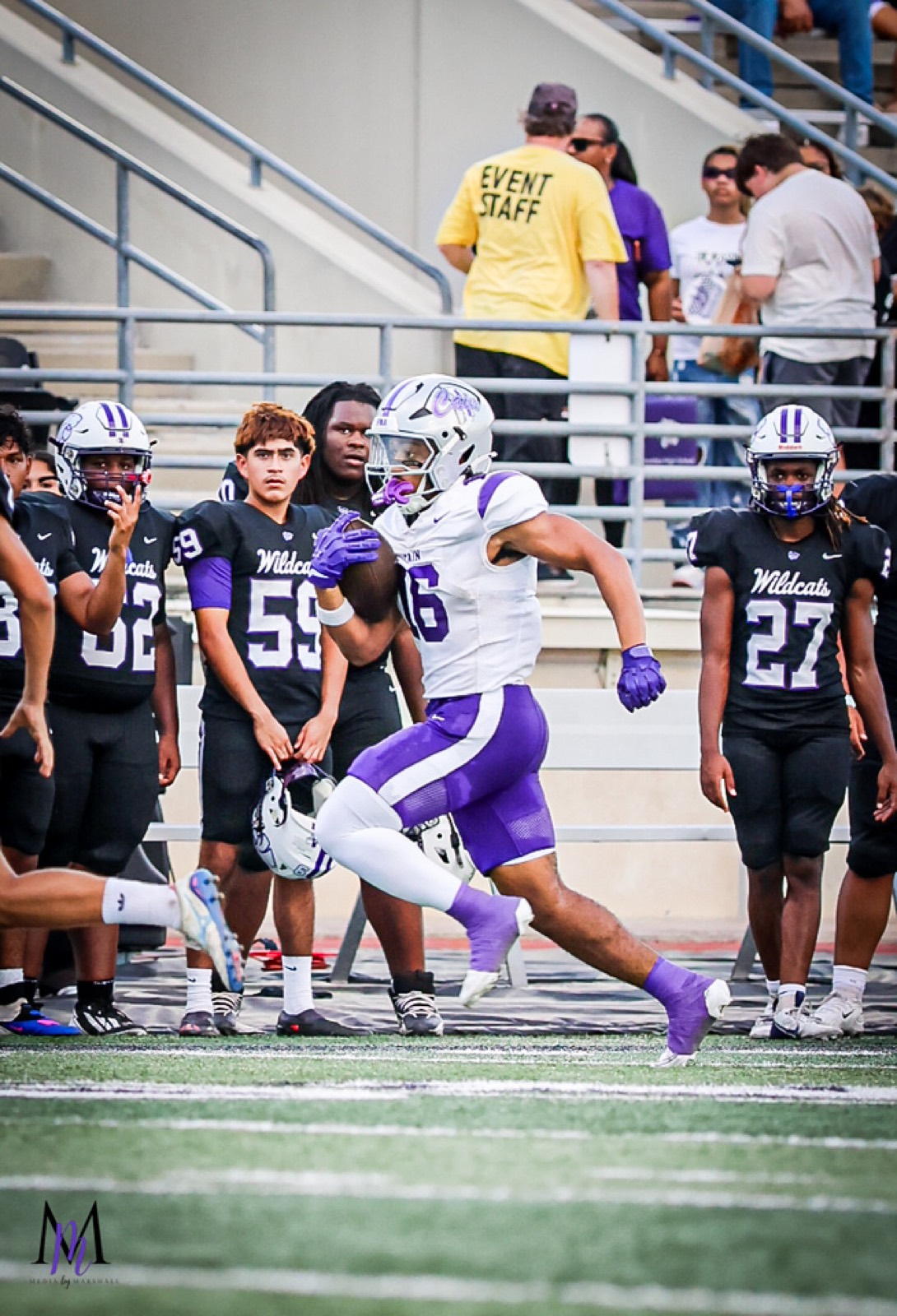 Senior running back Eyan Johnson sprints down the sideline past the Humble bench