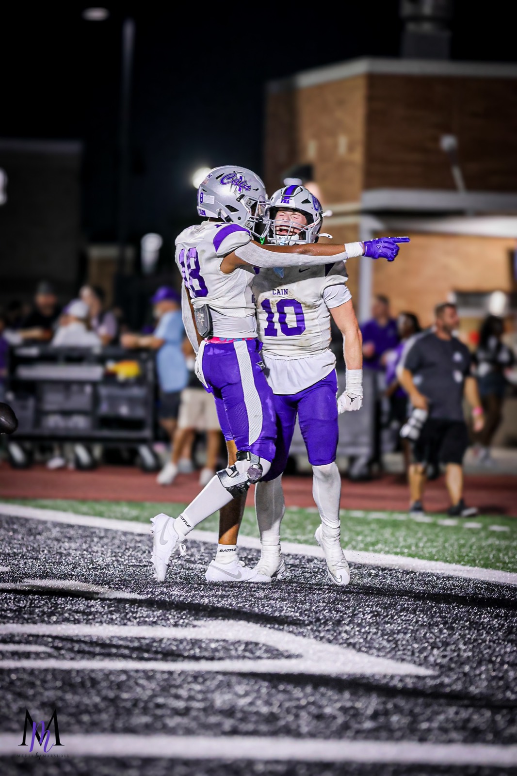 Senior wide receiver Cooper Karns and junior quarterback Jace Hanks celebrate a touchdown