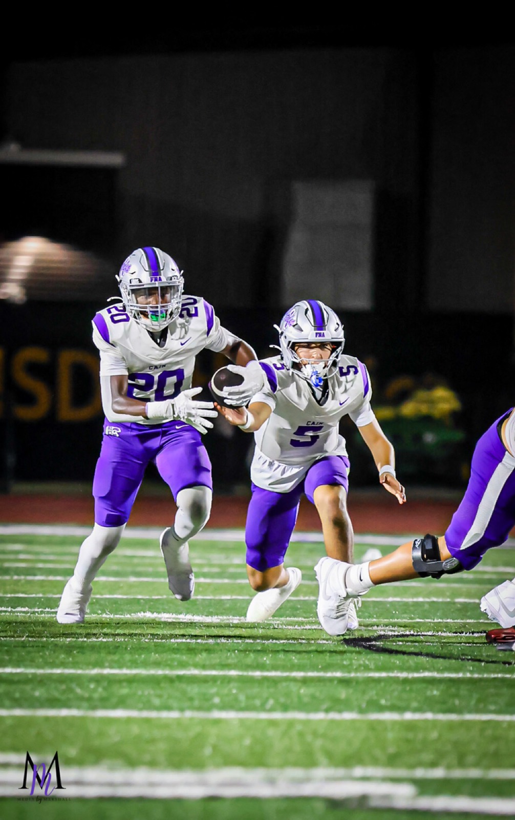 Senior quarterback Trey Reyes and junior running back Braylon Francis execute an option read mesh