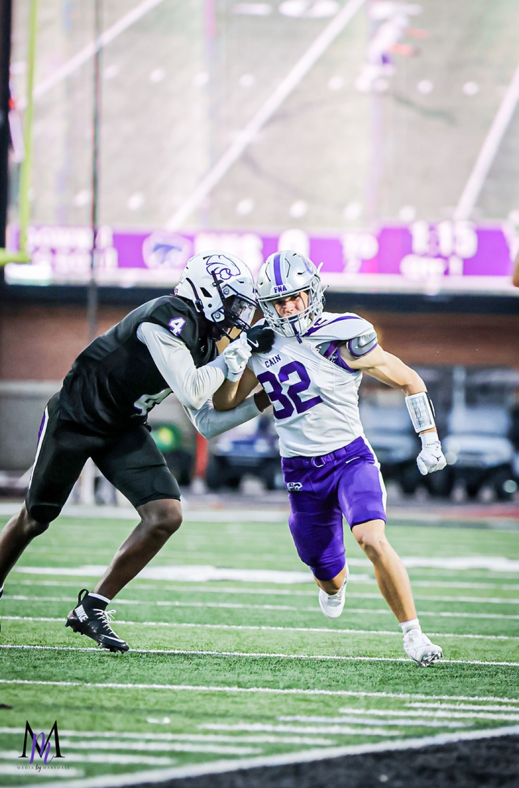 Senior defensive back Christian Redeo engages a Humble blocker on the perimeter