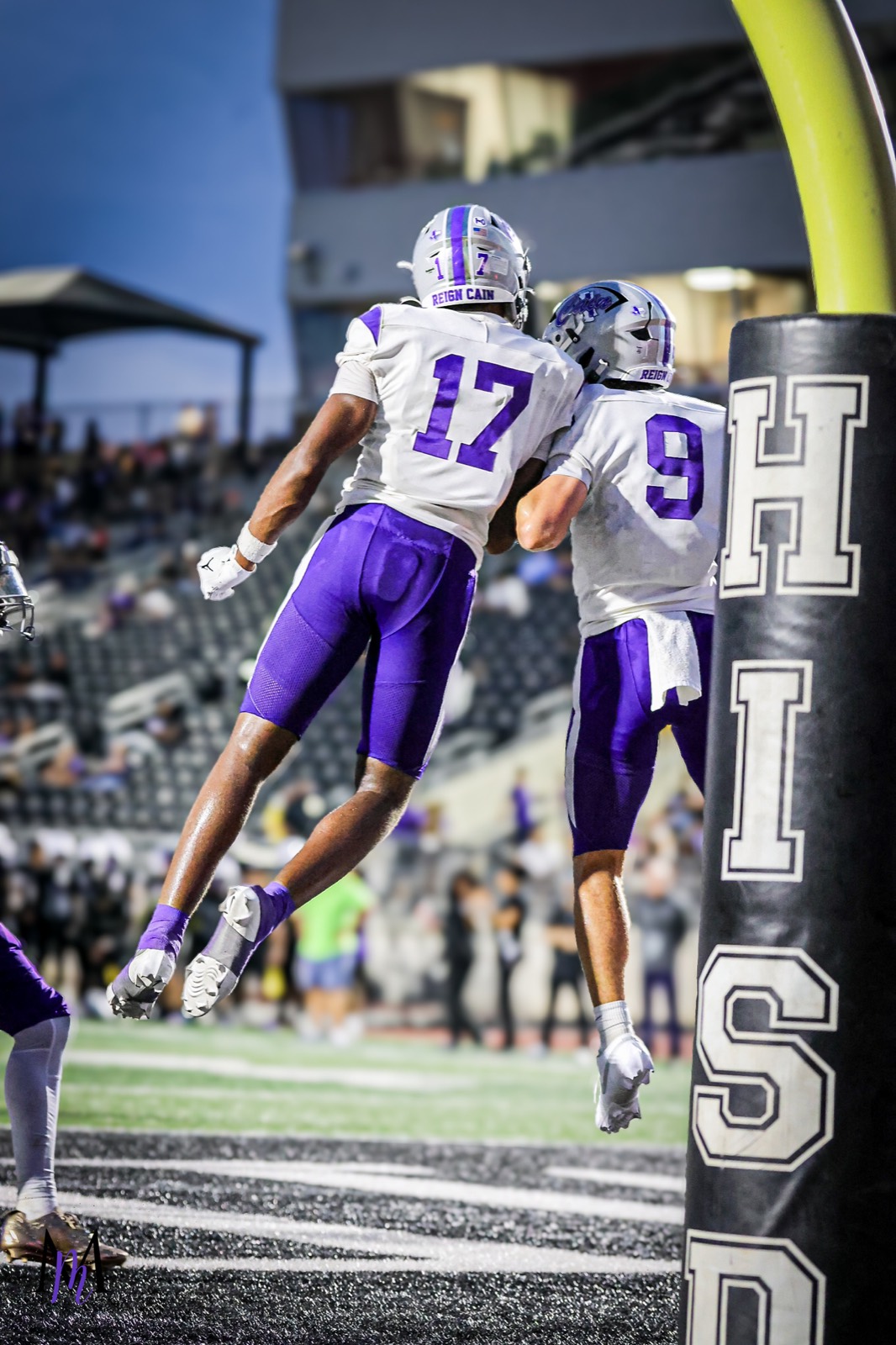 Sophomore wide receiver Ethan Hall and junior quarterback Jace Hanks meet mid-air for a celebratory chest bump in the end zone