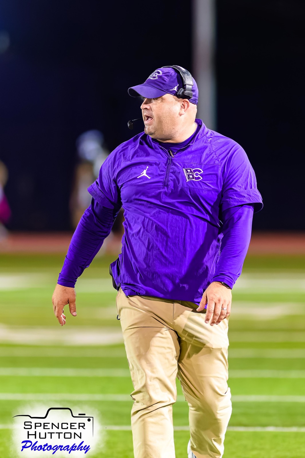 Head coach James Clancy paces the sideline directing the Hurricanes