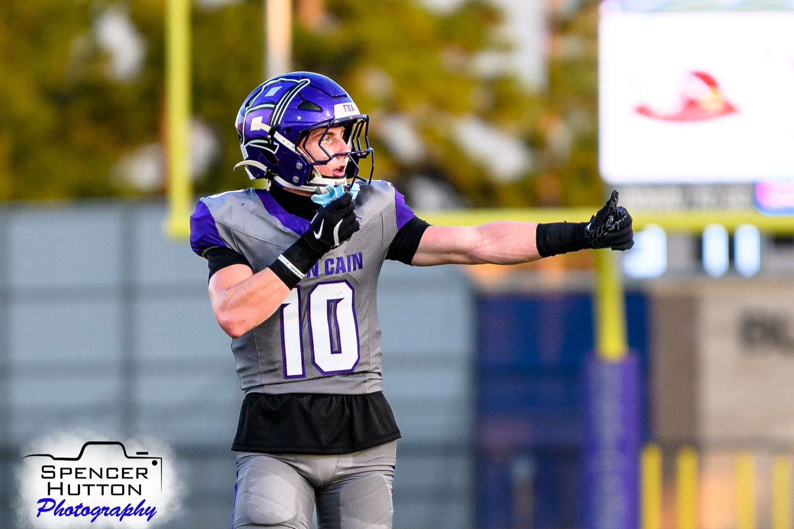 Senior wide receiver Cooper Karns signals before running his route downfield