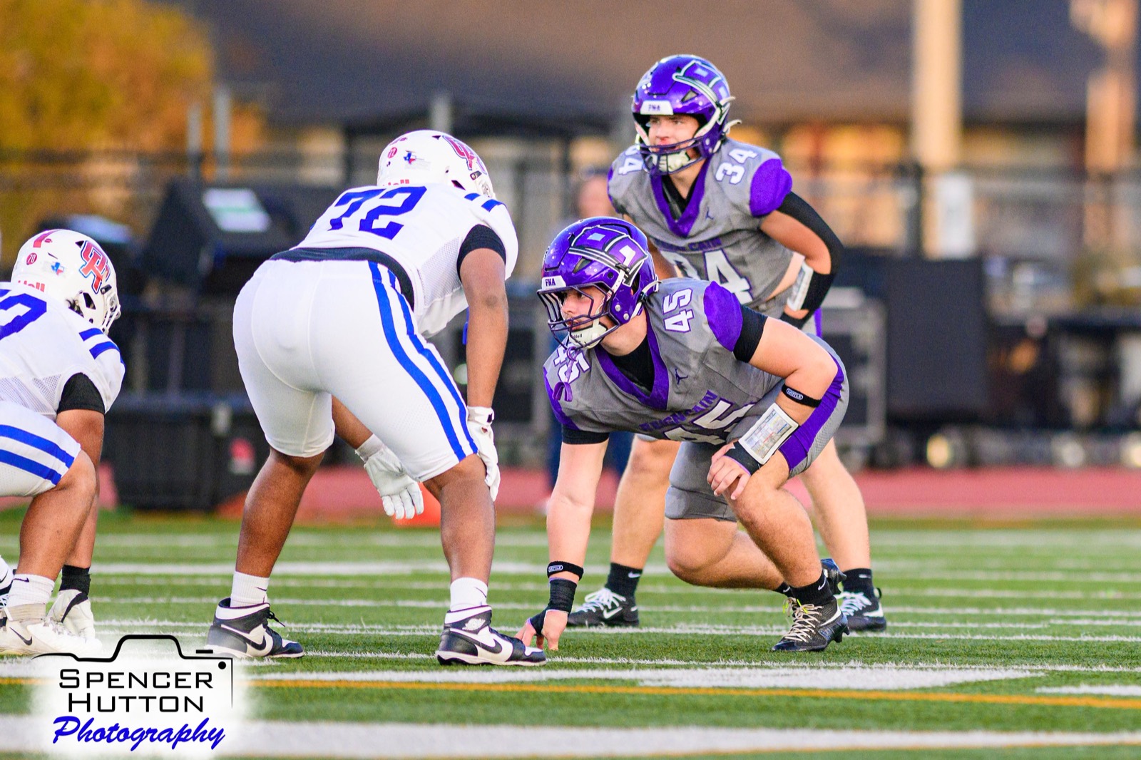 Senior defensive lineman Lovell Christian and senior linebacker Gage Hansberger in stance before the snap