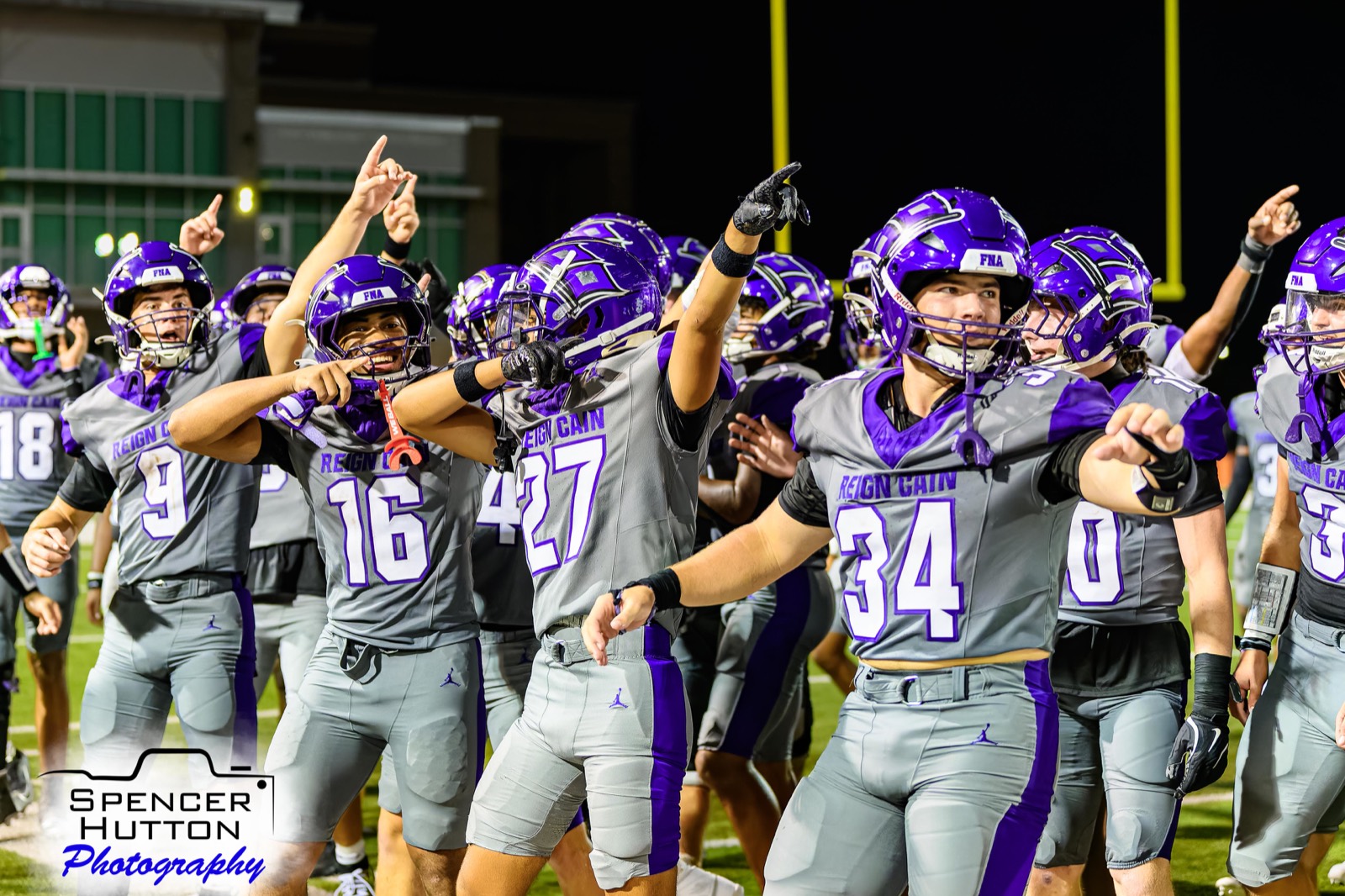 Senior running back Eyan Johnson, junior safety Easton Mizell, and senior linebacker Gage Hansberger celebrate the 45-20 victory